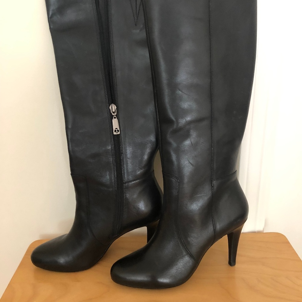Tall leather black boots